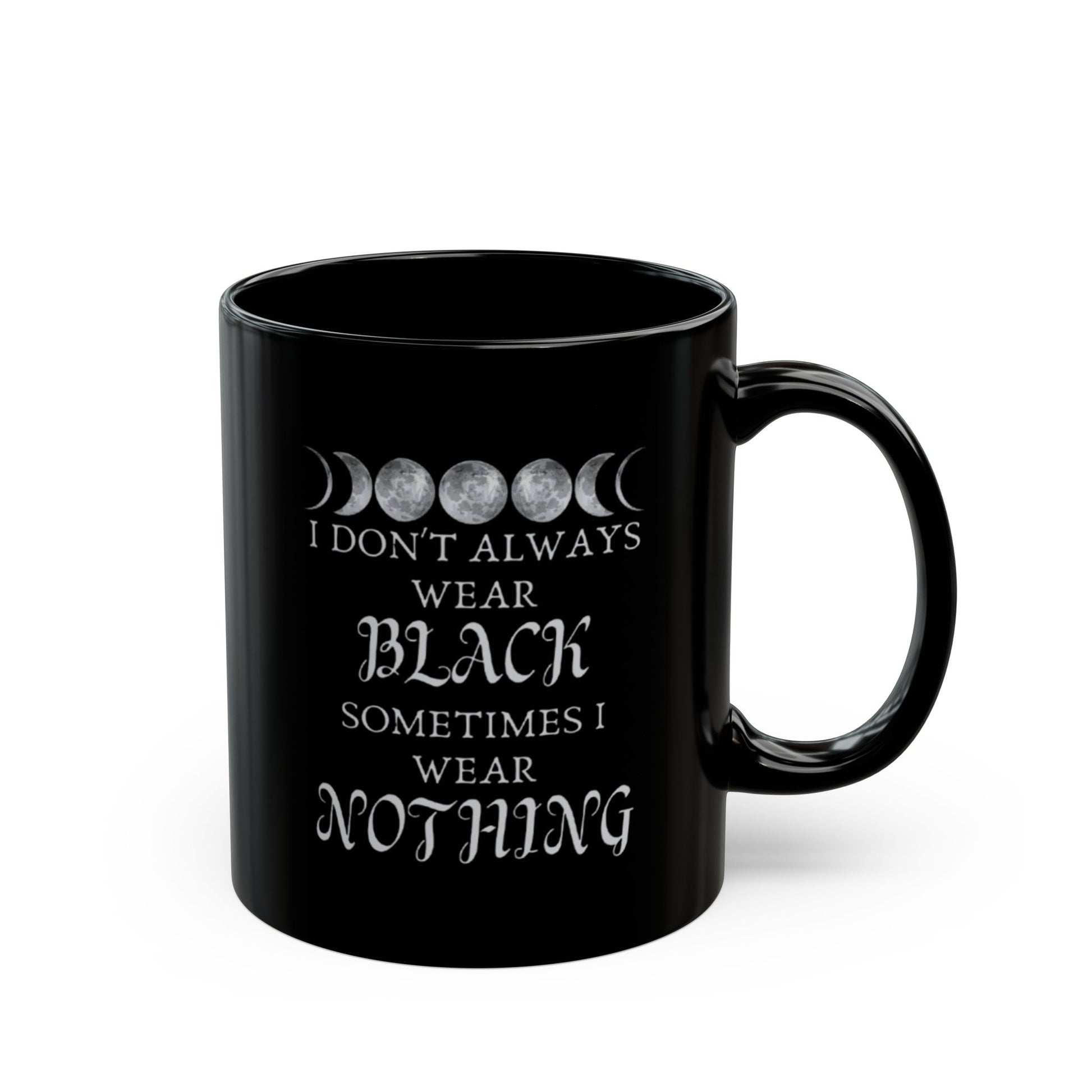 Black mug with white text and moon phases design on a white background