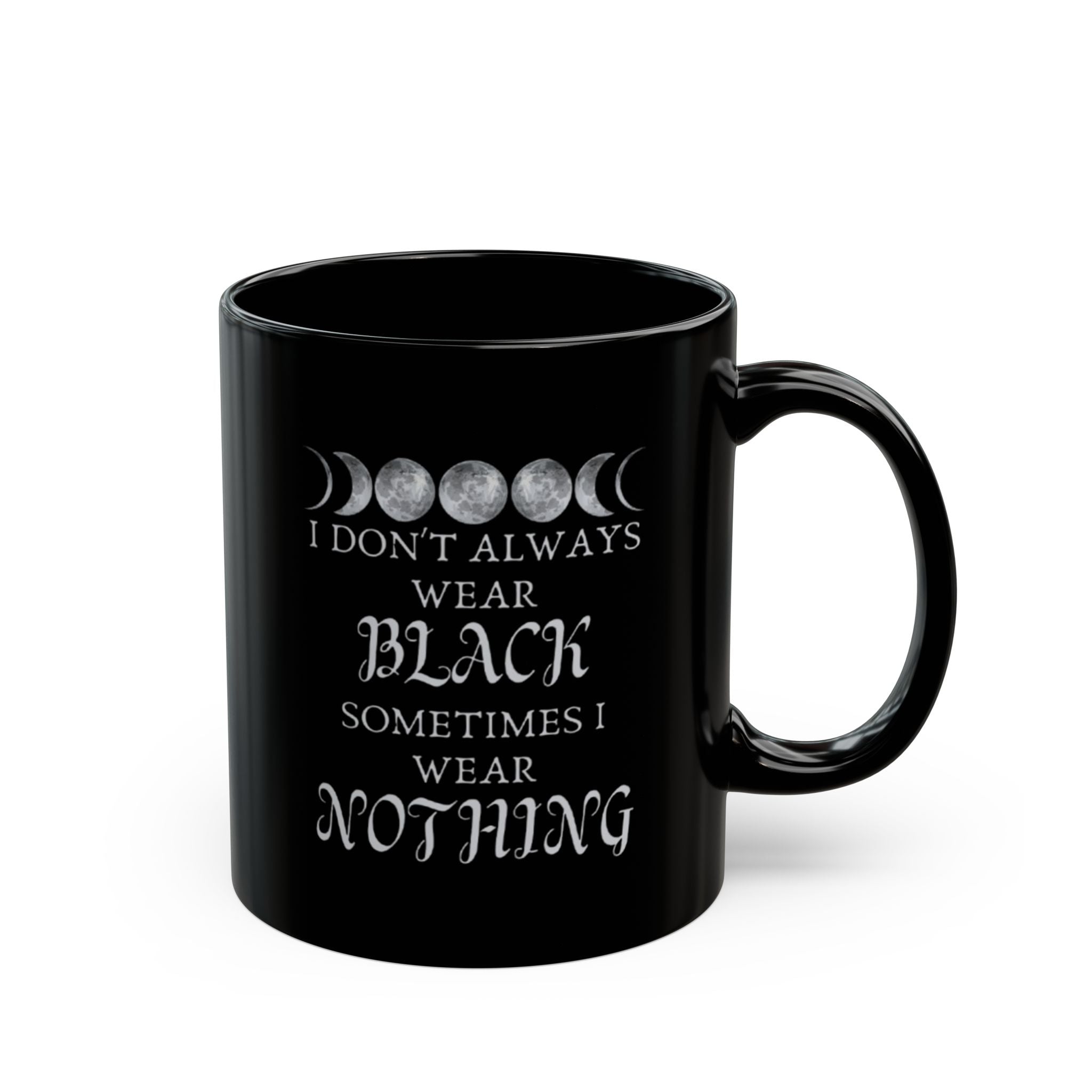 Black mug with white text and moon phases design on a white background