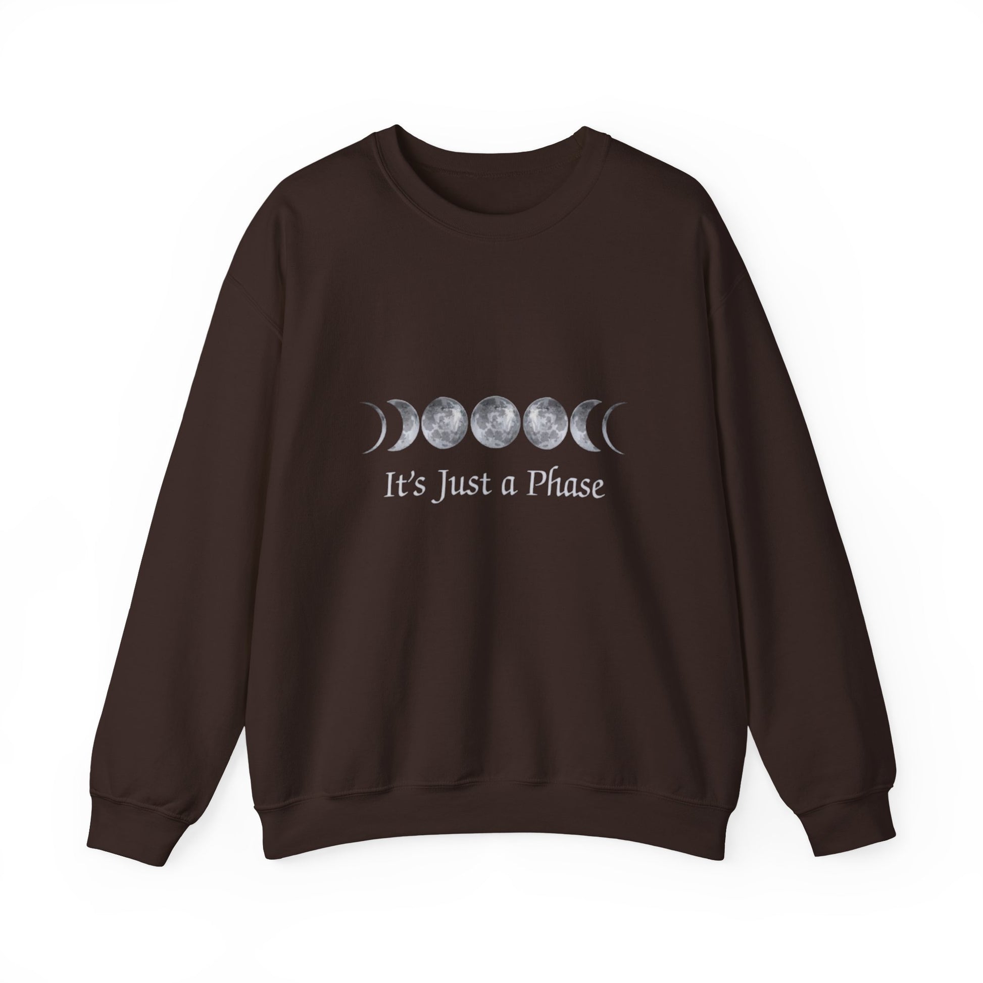 Brown sweatshirt with moon phase design and 'It's Just a Phase' text on a white background