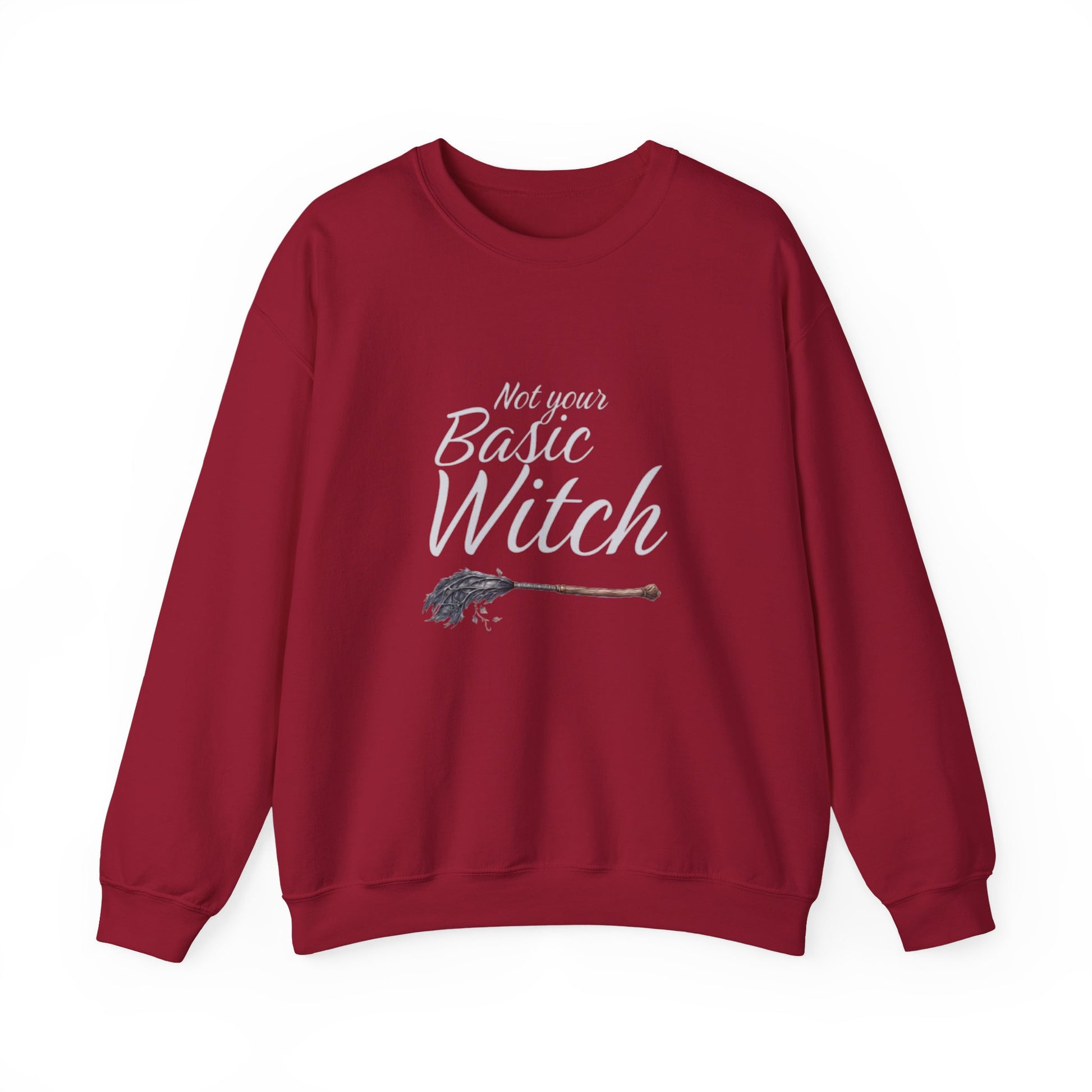 Red sweatshirt with 'Not your Basic Witch' text and broom graphic on a white background