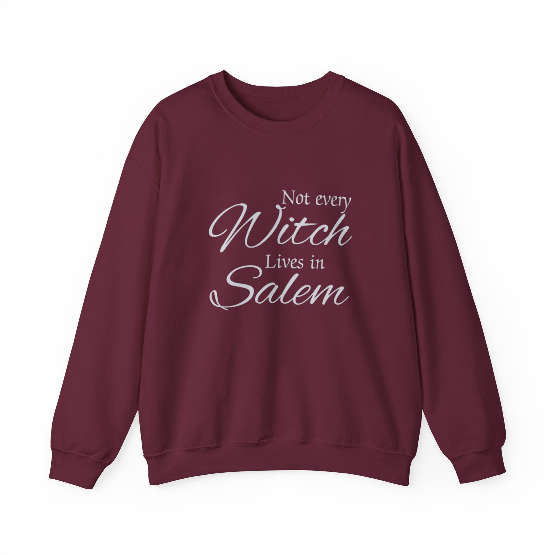 Maroon sweatshirt with white text 'Not every Witch Lives in Salem' on a white background
