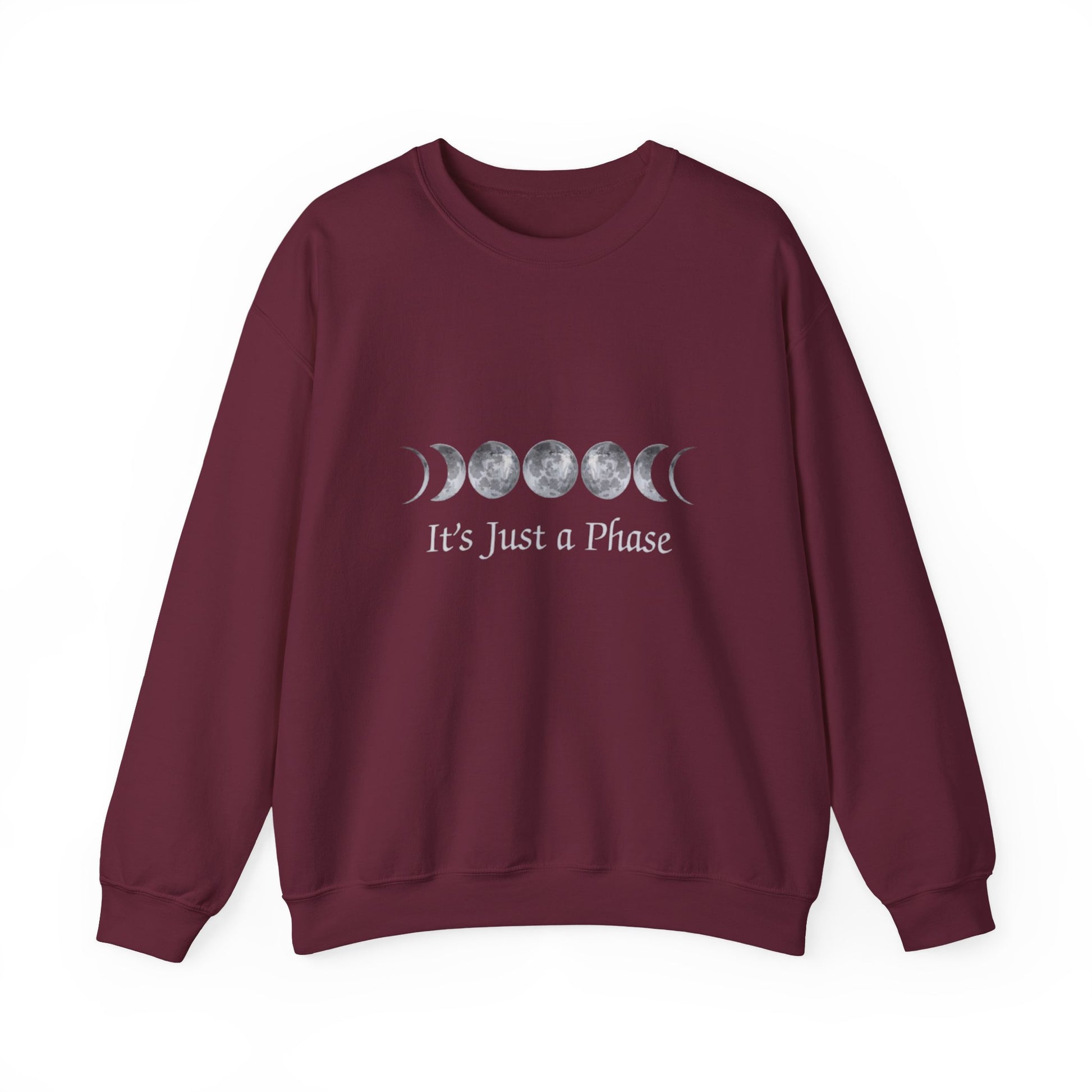 Maroon sweatshirt with moon phase design and 'It's Just a Phase' text on a white background