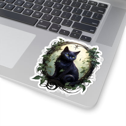 Laptop with a decorative sticker of a black cat surrounded by leaves on the palm rest area.