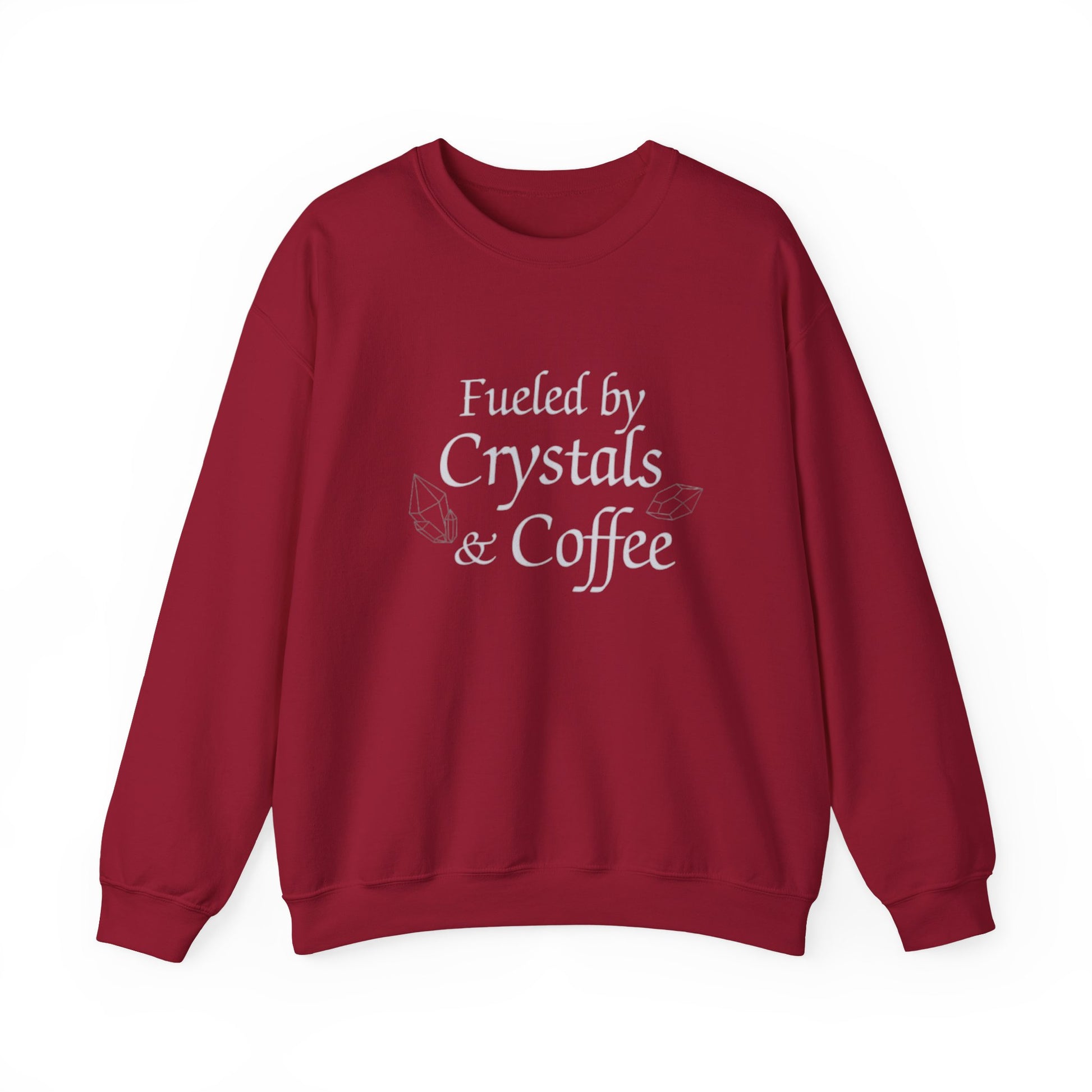 Red sweatshirt with 'Fueled by Crystals & Coffee' text on a white background