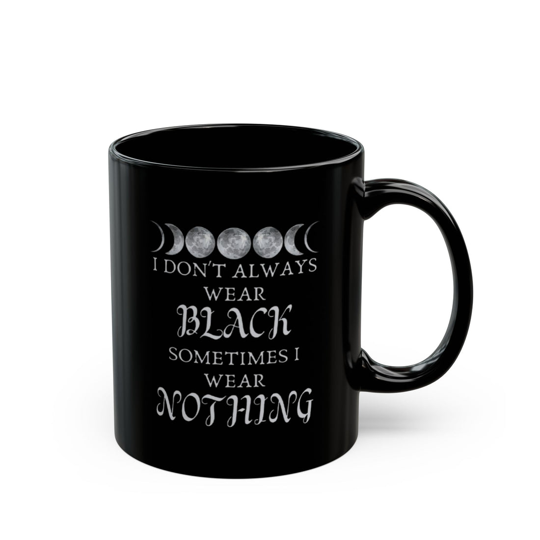Black mug with white text and moon phases design on a white background