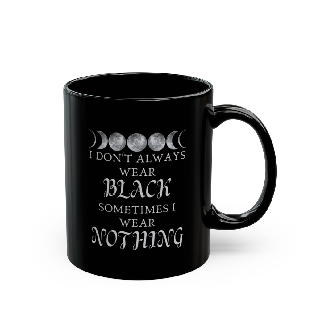 Black mug with white text and moon phases design on a white background